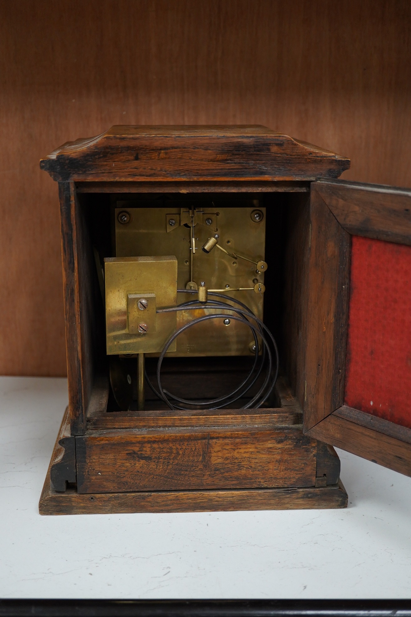 A late 19th century W&H oak cased mantel clock, chiming and striking on two coiled gongs, 27cm high. Condition - fair to good, missing the handle to the top